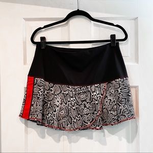 LUCKY IN LOVE Woman’s Tennis Skirt with Snake Skin